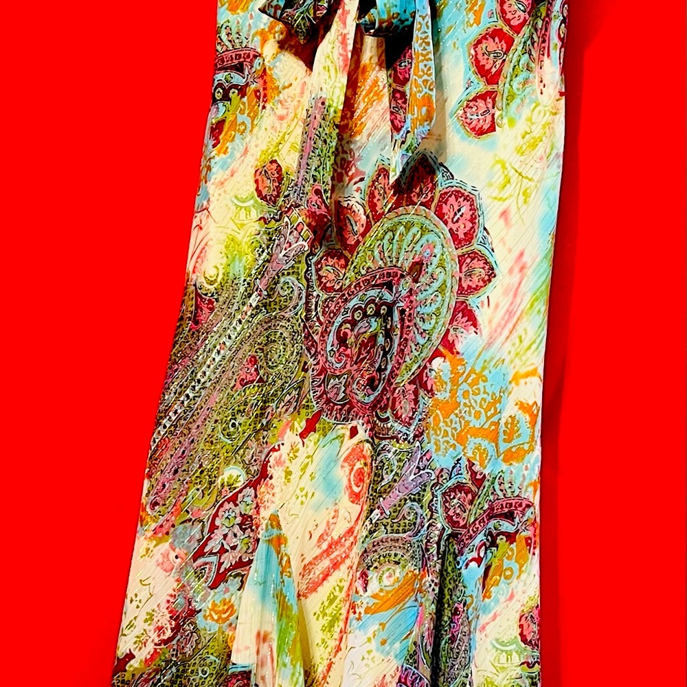 Size 8 been worn once and very comfortable.  Pastel with gold colors